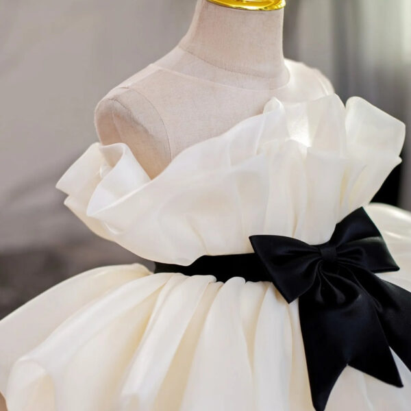 10_5ed949f7-91b1-4e89-b297-dcaad3102f99.jpg Champagne White Sleeveless Flower Girl Dress